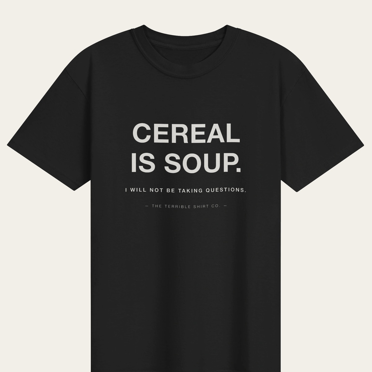 A black heavyweight tee reading CEREAL IS SOUP.