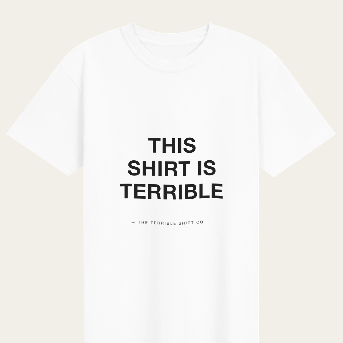 A white heavyweight tee reading THIS SHIRT IS TERRIBLE across the chest.