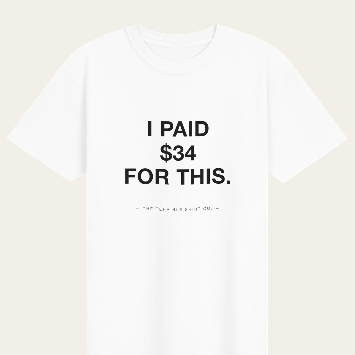 A white heavyweight tee reading I PAID $34 FOR THIS.